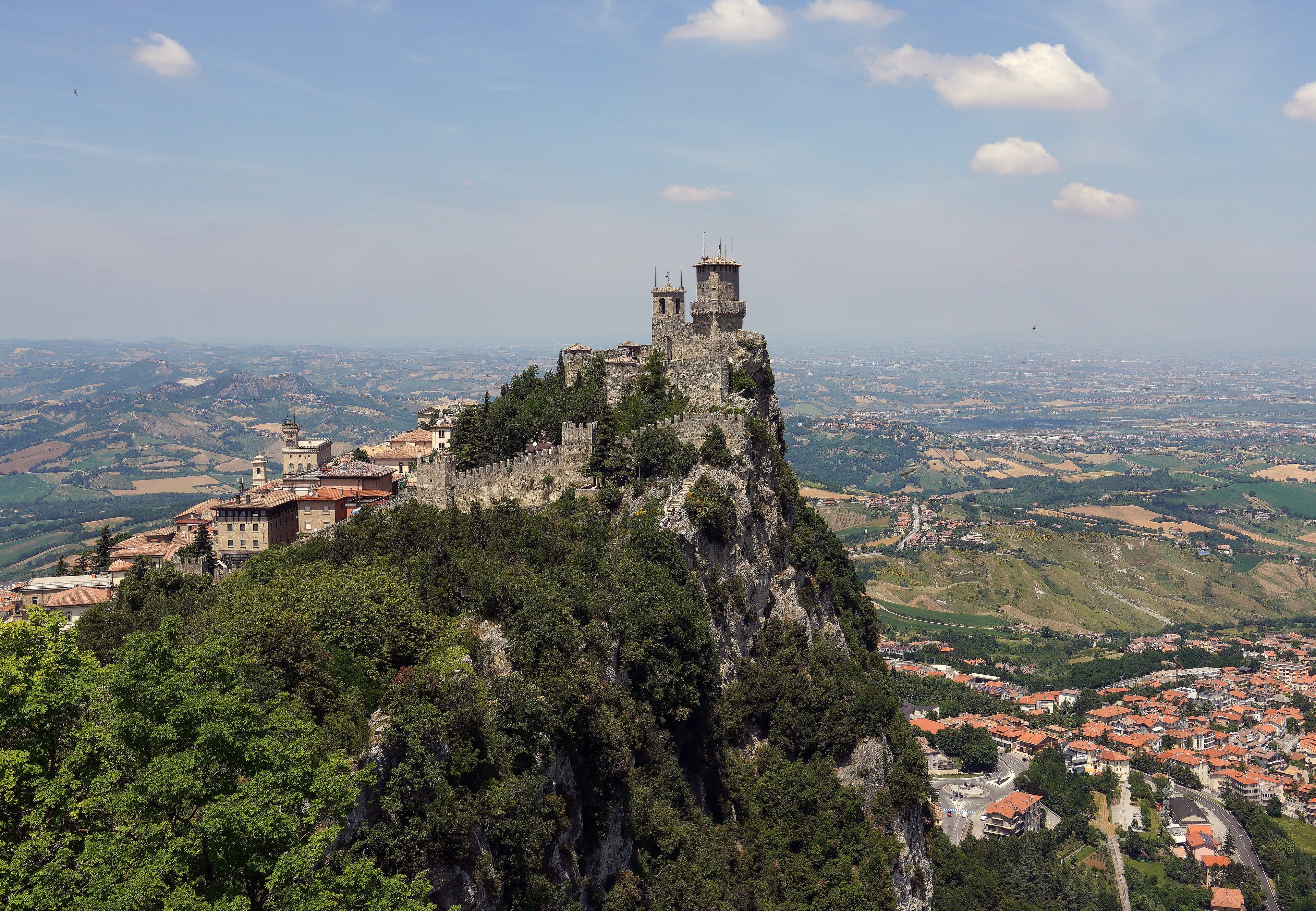 The three towers of San Marino perched on the rocky ridge of Mount Titano