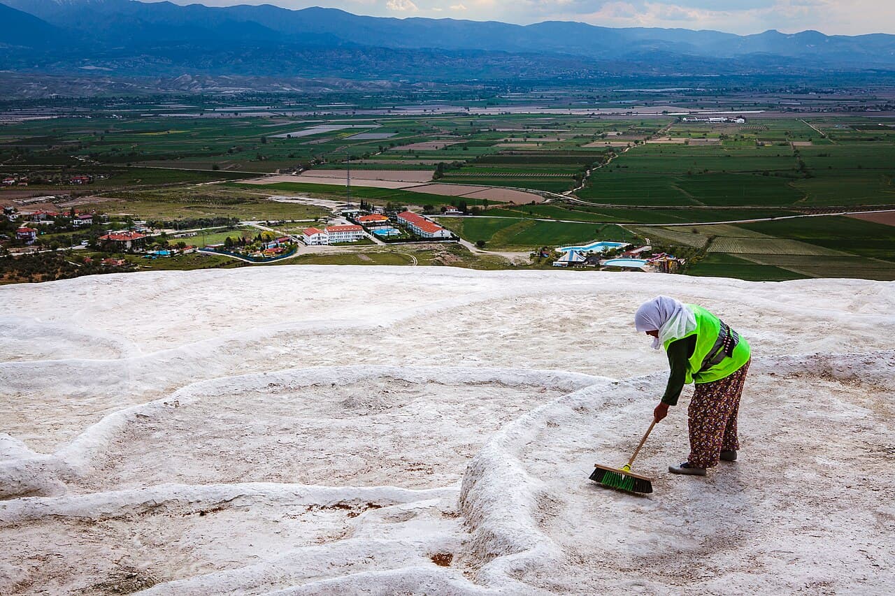 The white travertine terraces of Pamukkale with pools of blue water
