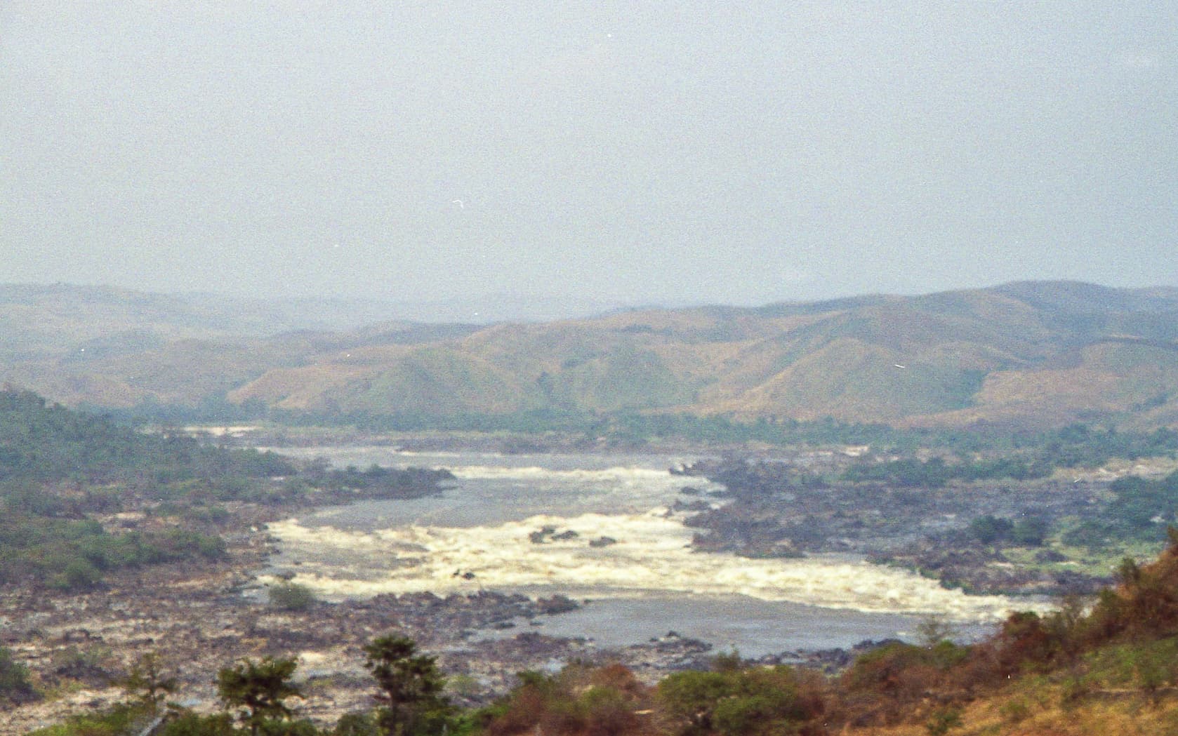 Churning white water rapids of Inga Falls on the Congo River